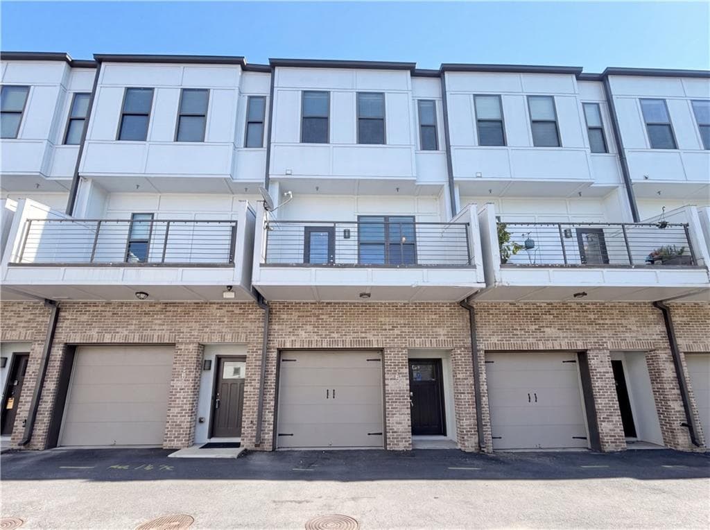 2 bedroom, 3 bathroom, 1,800 sq ft townhouse for sale at 2030 Main Street 203, Atlanta, GA 30318
