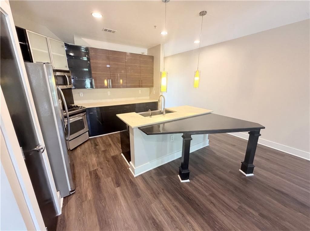2 bedroom, 3 bathroom, 1,800 sq ft townhouse for sale at 2030 Main Street 203, Atlanta, GA 30318 — photo 2