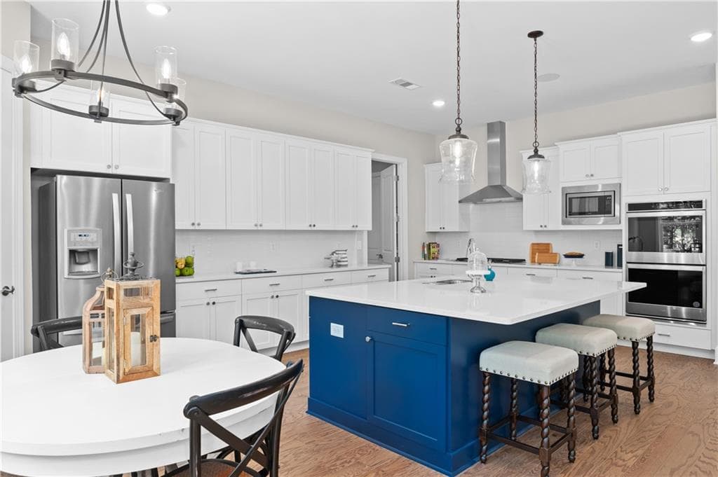 5 bedroom, 4 bathroom, 3,590 sq ft single family residence for sale at 6135 Peaceful Grove (Lot 48) Drive, Cumming, GA 30041 — photo 5
