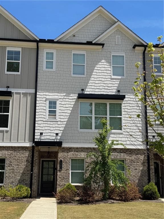 4 bedroom, 4 bathroom, 2,324 sq ft townhouse for rent at 1202 Ainsworth Alley, Sugar Hill, GA 30518 for $2,995 a month — photo 1 of 27