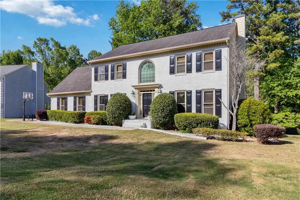 6 bedroom, 4 bathroom, 4,083 sq ft single family residence sold at 411 Sarah Lane, Lawrenceville, GA 30046
