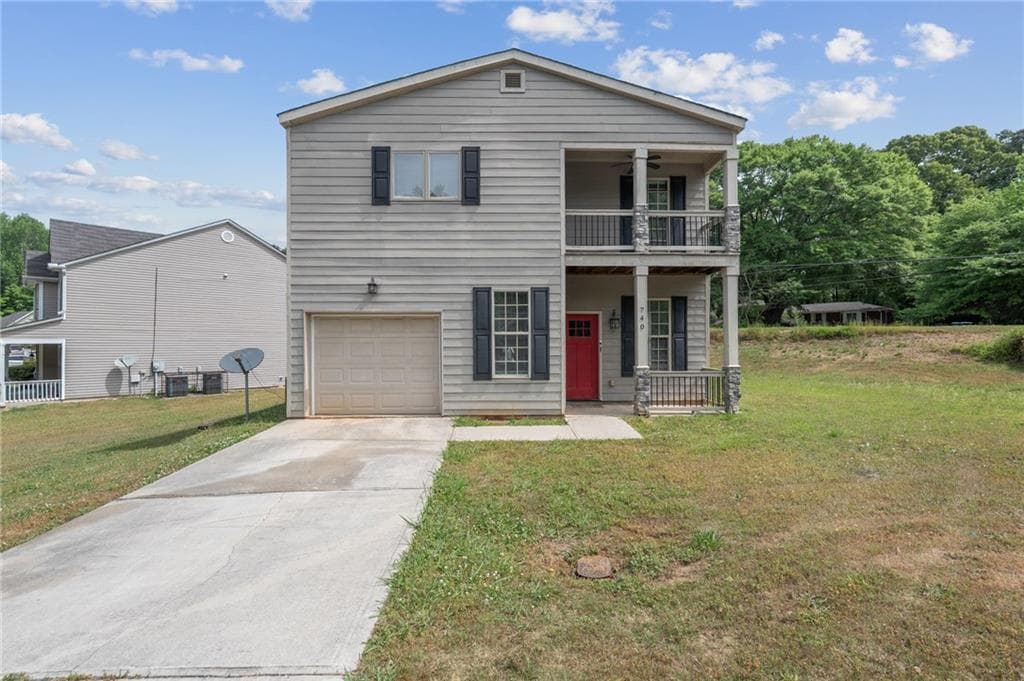 3 bedroom, 3 bathroom, 1,944 sq ft single family residence for sale at 740 Dot Drive, Atlanta, GA 30349 — photo 1 of 38