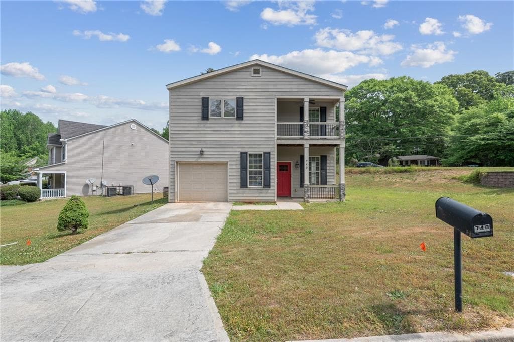 3 bedroom, 3 bathroom, 1,944 sq ft single family residence for sale at 740 Dot Drive, Atlanta, GA 30349 — photo 2