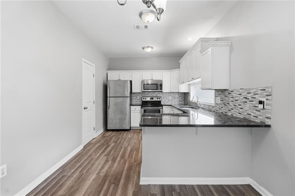 3 bedroom, 3 bathroom, 1,944 sq ft single family residence for sale at 740 Dot Drive, Atlanta, GA 30349 — photo 10