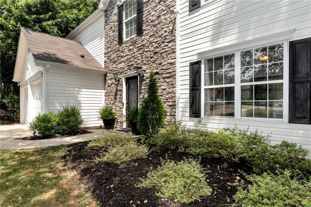 4 bedroom, 3 bathroom, 2,152 sq ft single family residence for sale at 4205 Ridgebrook Bend, Cumming, GA 30028 — photo 2