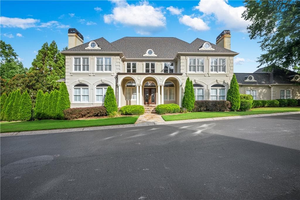 6 bedroom, 5 bathroom, 7,288 sq ft single family residence for sale at 2204 Iron Gate Drive, Smyrna, GA 30080