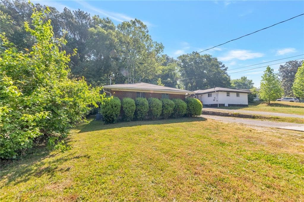 4 bedroom, 2 bathroom, 1,450 sq ft single family residence for sale at 1097 Cordova Street, Atlanta, GA 30310 — photo 2
