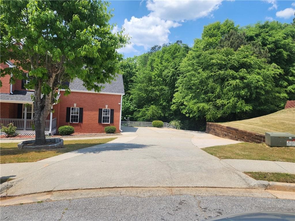 4 bedroom, 4 bathroom, 3,224 sq ft single family residence for sale at 2436 Green Hollow Court, Conyers, GA 30012 — photo 4