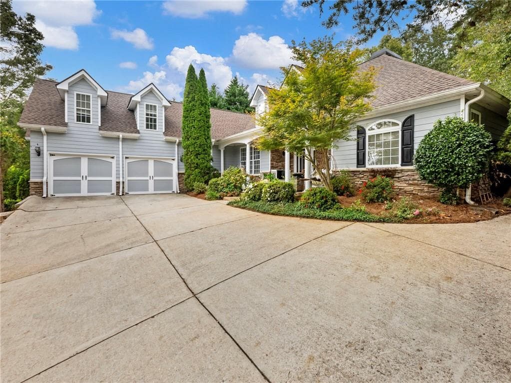 5 bedroom, 4 bathroom, 4,972 sq ft single family residence sold at 2641 Waters Edge Drive, Gainesville, GA 30504