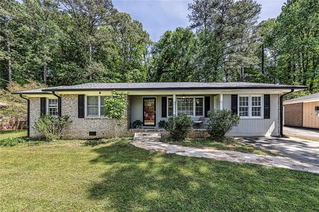 4 bedroom, 2 bathroom, 1,572 sq ft single family residence for sale at 3105 Highland Drive, Smyrna, GA 30080 — photo 1 of 33