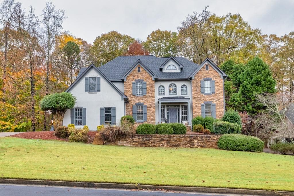 6 bedroom, 6 bathroom, 4,975 sq ft single family residence sold at 3585 Hidden Lake Drive, Cumming, GA 30041