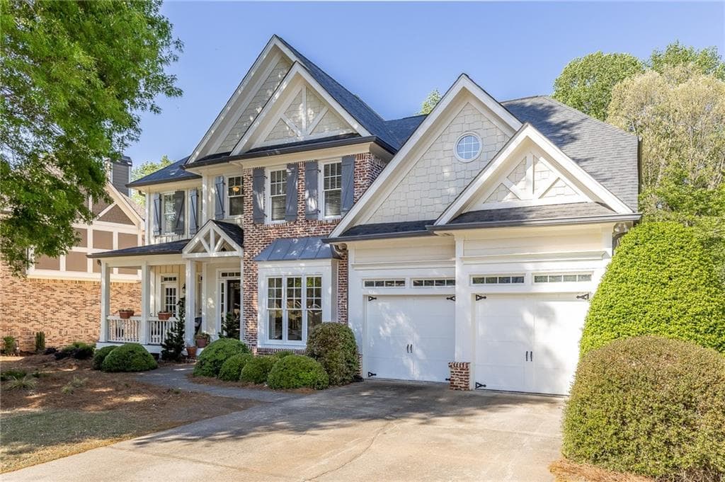 5 bedroom, 3 bathroom, 4,846 sq ft single family residence for sale at 5939 Grand Loop Road, Sugar Hill, GA 30518 — photo 2