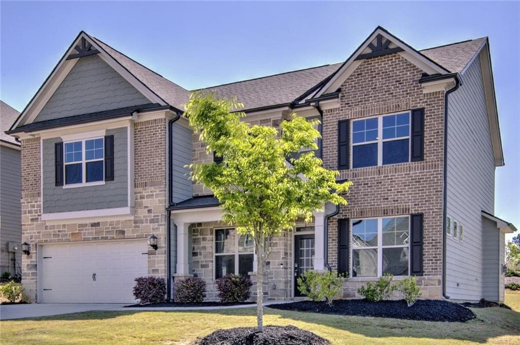 4 bedroom, 3 bathroom, 3,204 sq ft single family residence for sale at 7107 Branch Creek Cove, Flowery Branch, GA 30542 — photo 3
