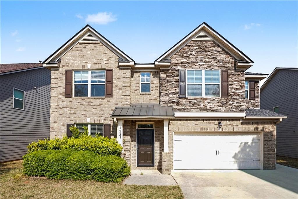 4 bedroom, 3 bathroom, 3,158 sq ft single family residence for sale at 1285 Polk Crossing, Mcdonough, GA 30252 — photo 1 of 35