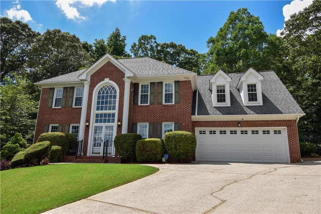 4 bedroom, 4 bathroom, 3,977 sq ft single family residence for sale at 1858 De Winton Place, Lawrenceville, GA 30043 — photo 2