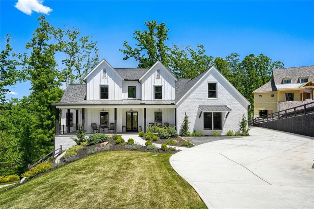 5 bedroom, 4 bathroom, 6,176 sq ft single family residence for sale at 4475 Pebble Rock Drive, Cumming, GA 30041 — photo 2