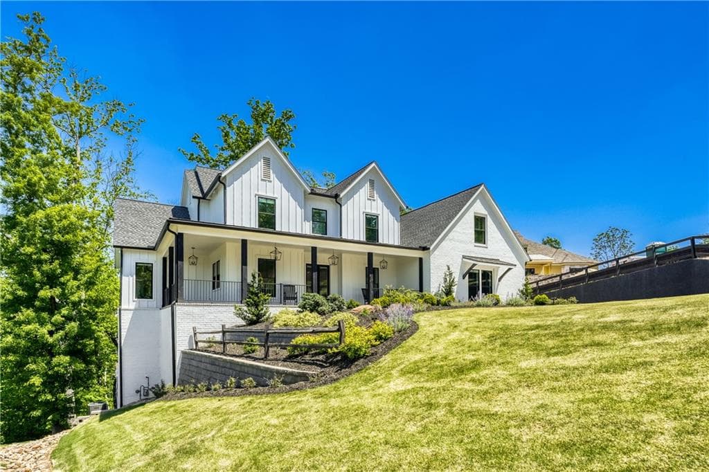 5 bedroom, 4 bathroom, 6,176 sq ft single family residence for sale at 4475 Pebble Rock Drive, Cumming, GA 30041 — photo 3