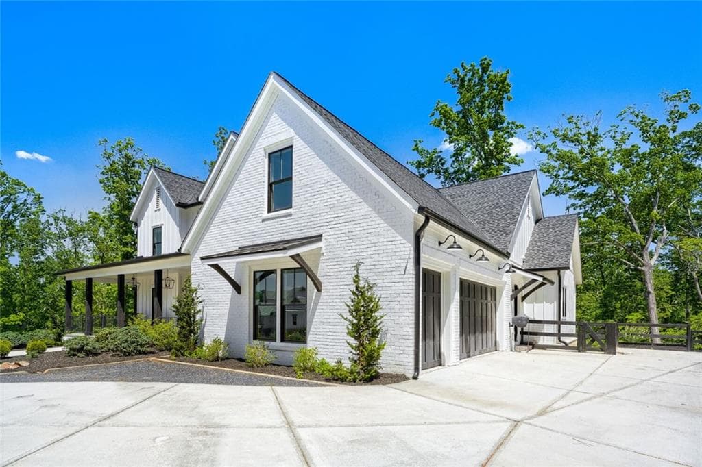 5 bedroom, 4 bathroom, 6,176 sq ft single family residence for sale at 4475 Pebble Rock Drive, Cumming, GA 30041 — photo 4