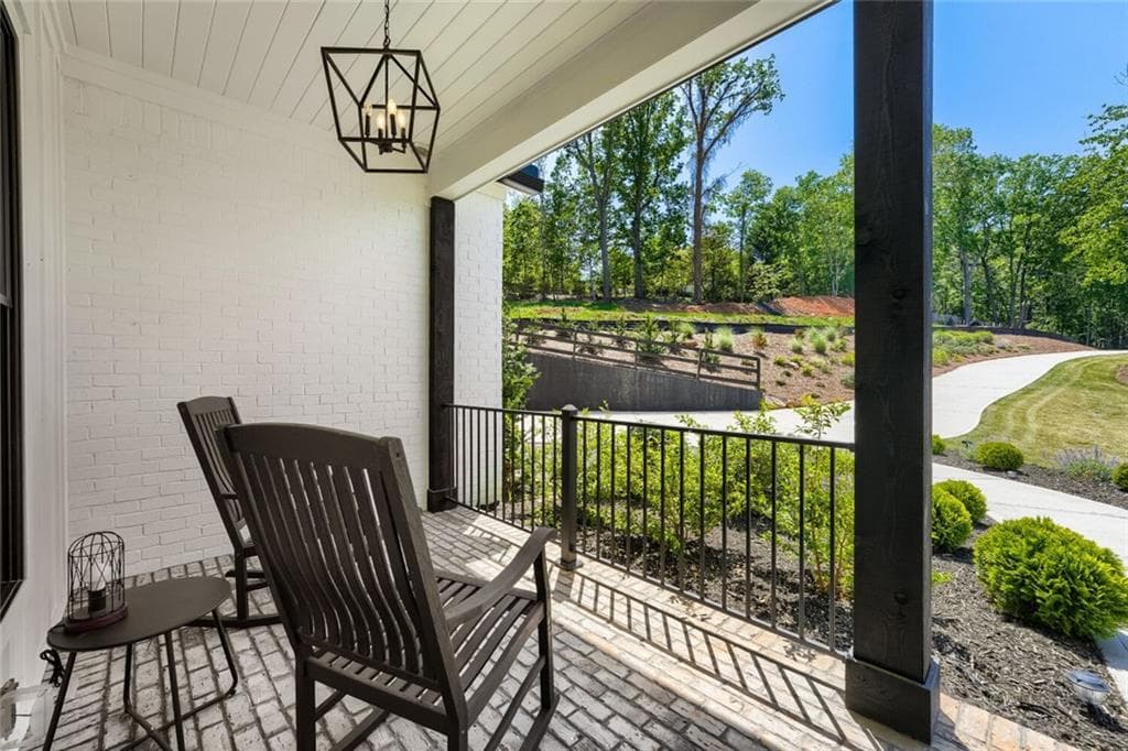 5 bedroom, 4 bathroom, 6,176 sq ft single family residence for sale at 4475 Pebble Rock Drive, Cumming, GA 30041 — photo 6