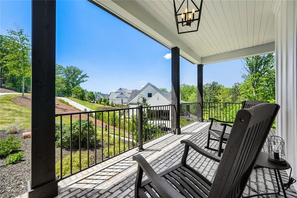 5 bedroom, 4 bathroom, 6,176 sq ft single family residence for sale at 4475 Pebble Rock Drive, Cumming, GA 30041 — photo 7