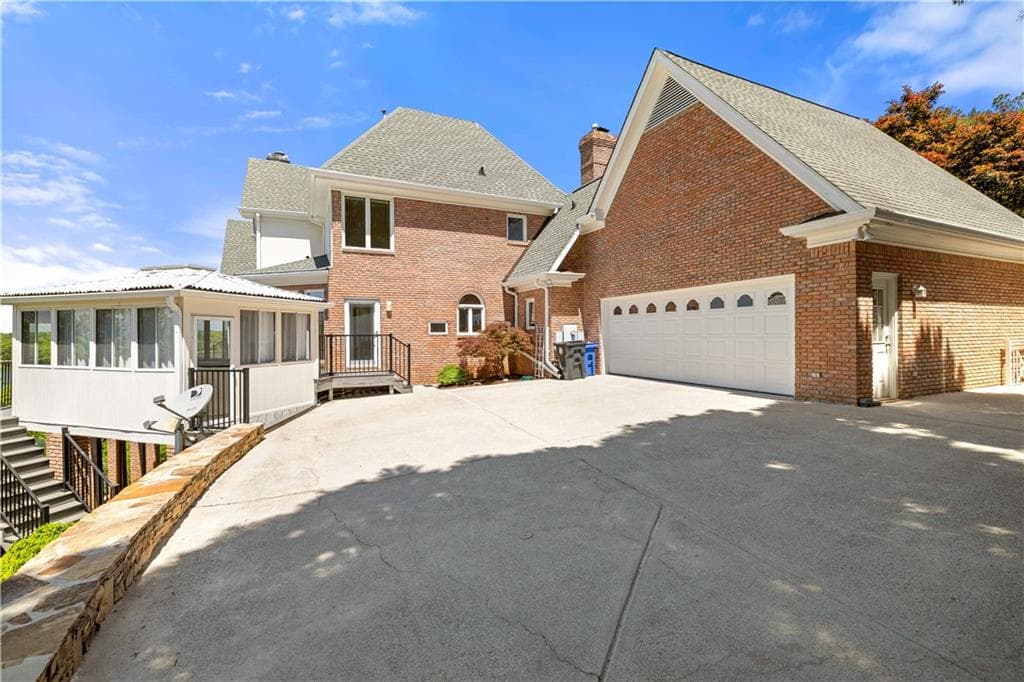 6 bedroom, 5 bathroom, 6,010 sq ft single family residence for sale at 3143 Winding Lake Drive, Gainesville, GA 30504 — photo 8