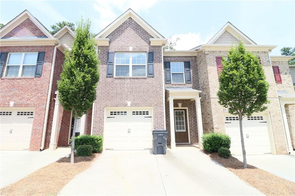 3 bedroom, 3 bathroom, 1,696 sq ft townhouse sold at 323 Knelston Oak Drive, Suwanee, GA 30024