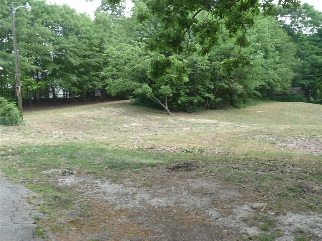 3 bedroom, 1 bathroom, 1,689 sq ft single family residence for sale at 1184 Highway 124, Hoschton, GA 30548 — photo 2