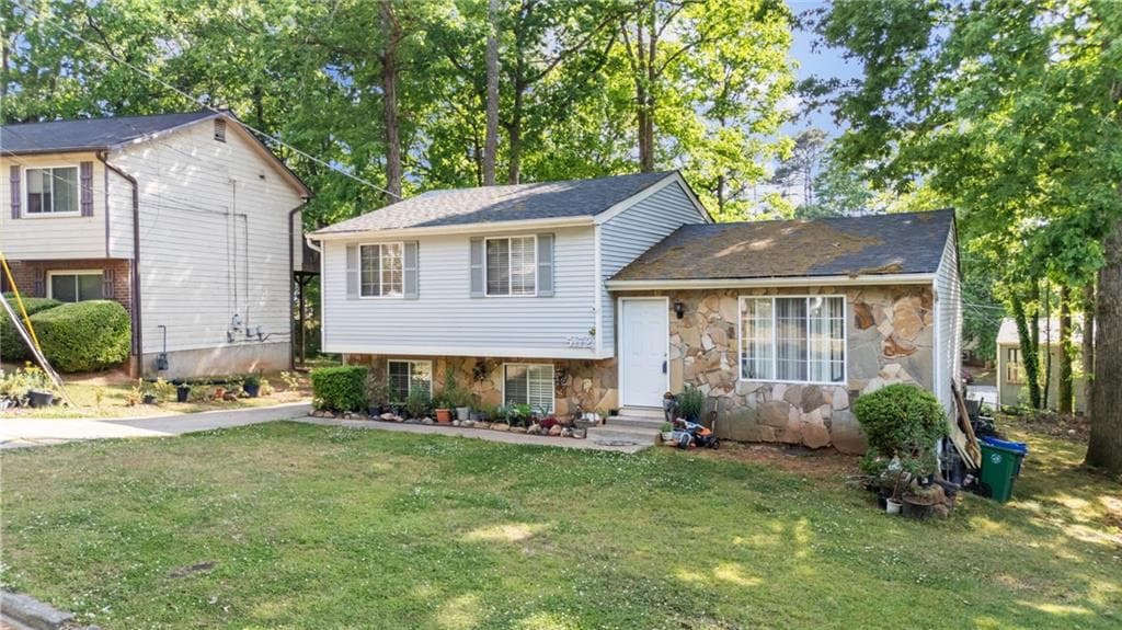 5 bedroom, 3 bathroom, 2,160 sq ft single family residence for sale at 5172 Scarbrough Trail, Stone Mountain, GA 30088 — photo 3