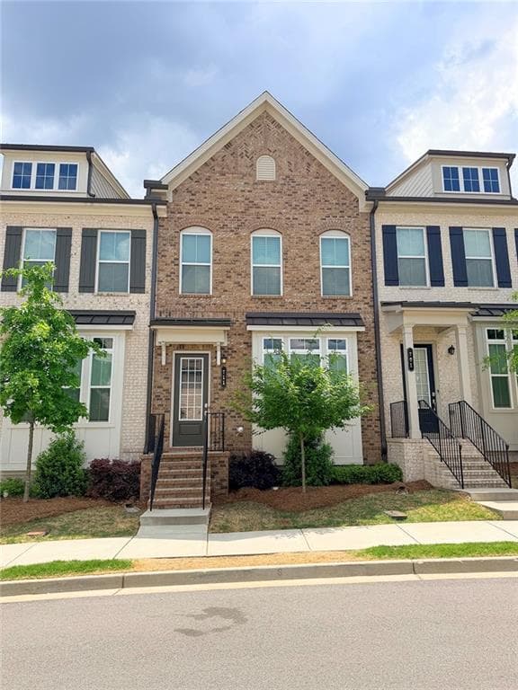 4 bedroom, 4 bathroom, 2,289 sq ft townhouse for rent at 711 Cordele Lane, Sugar Hill, GA 30518 for $2,500 a month — photo 1 of 20