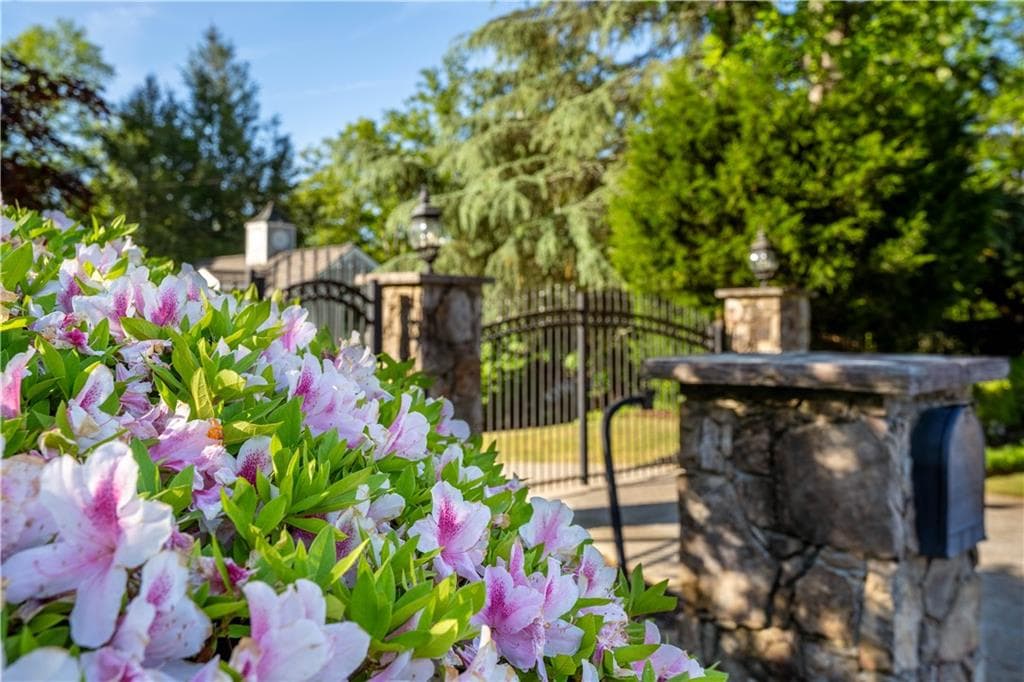 6 bedroom, 7 bathroom, 5,340 sq ft single family residence for sale at 5983 Nachoochee Trail, Flowery Branch, GA 30542 — photo 3