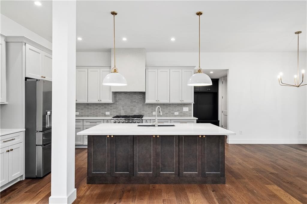 4 bedroom, 3 bathroom, 2,618 sq ft single family residence for sale at 6535 Riley Road, Cumming, GA 30028 — photo 4