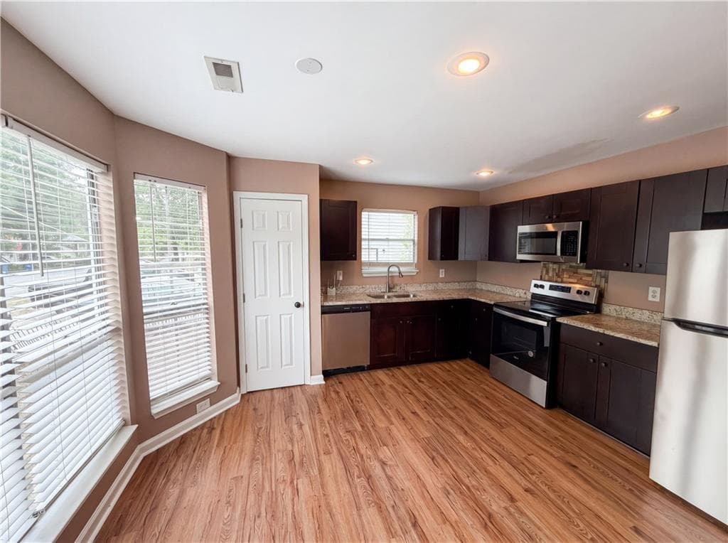 3 bedroom, 2 bathroom, 2,772 sq ft single family residence for sale at 7020 Greenbower Lane, Atlanta, GA 30349 — photo 2