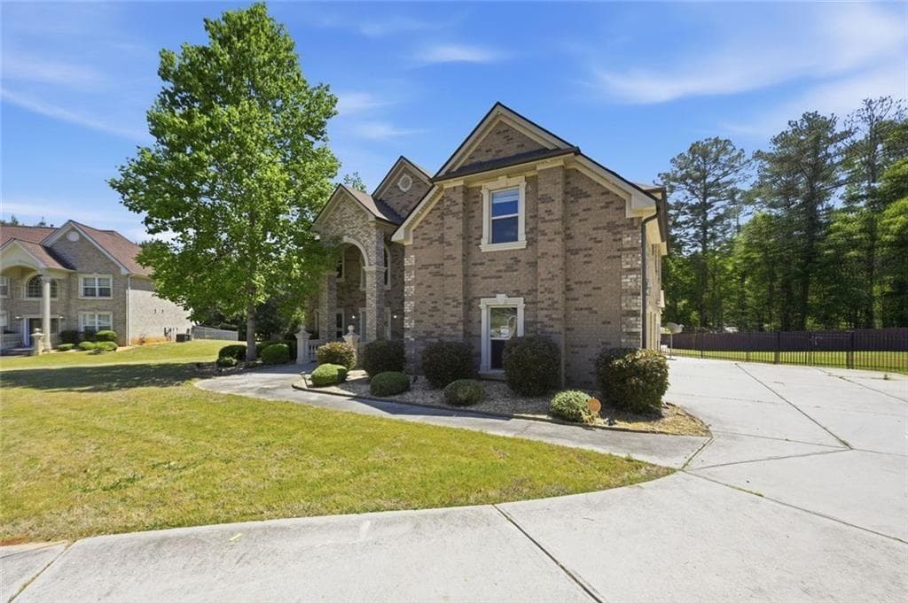 5 bedroom, 6 bathroom, 4,128 sq ft single family residence under contract at 1309 SW Marseille Court, Conyers, GA 30094 — photo 3
