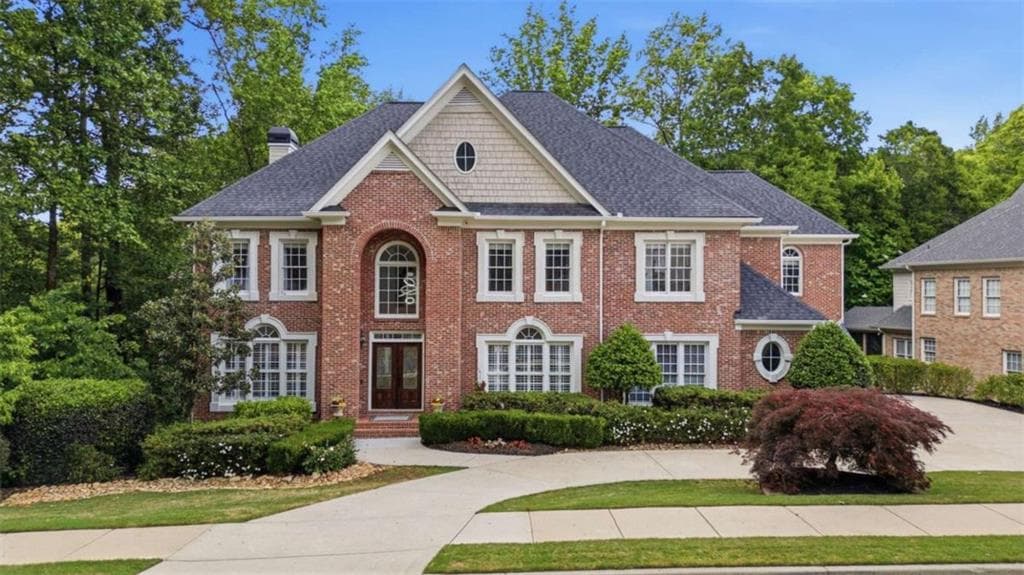 6 bedroom, 8 bathroom, 7,059 sq ft single family residence for sale at 4545 Bastion Drive, Roswell, GA 30075 — photo 2