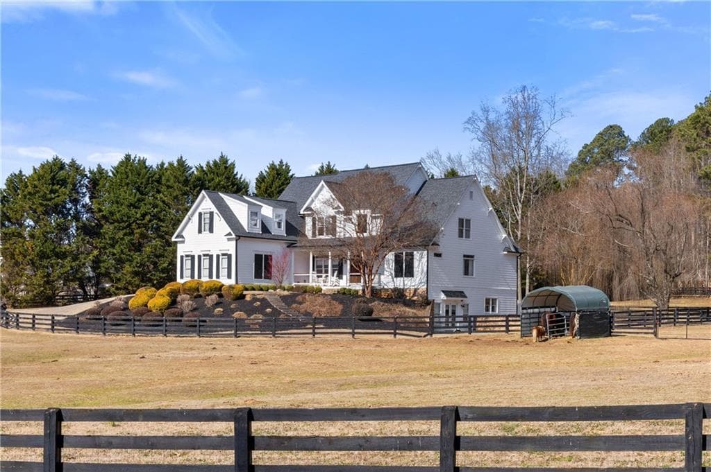 6 bedroom, 5 bathroom, 5,325 sq ft single family residence sold at 100 Hunting Valley Trail, Cumming, GA 30040