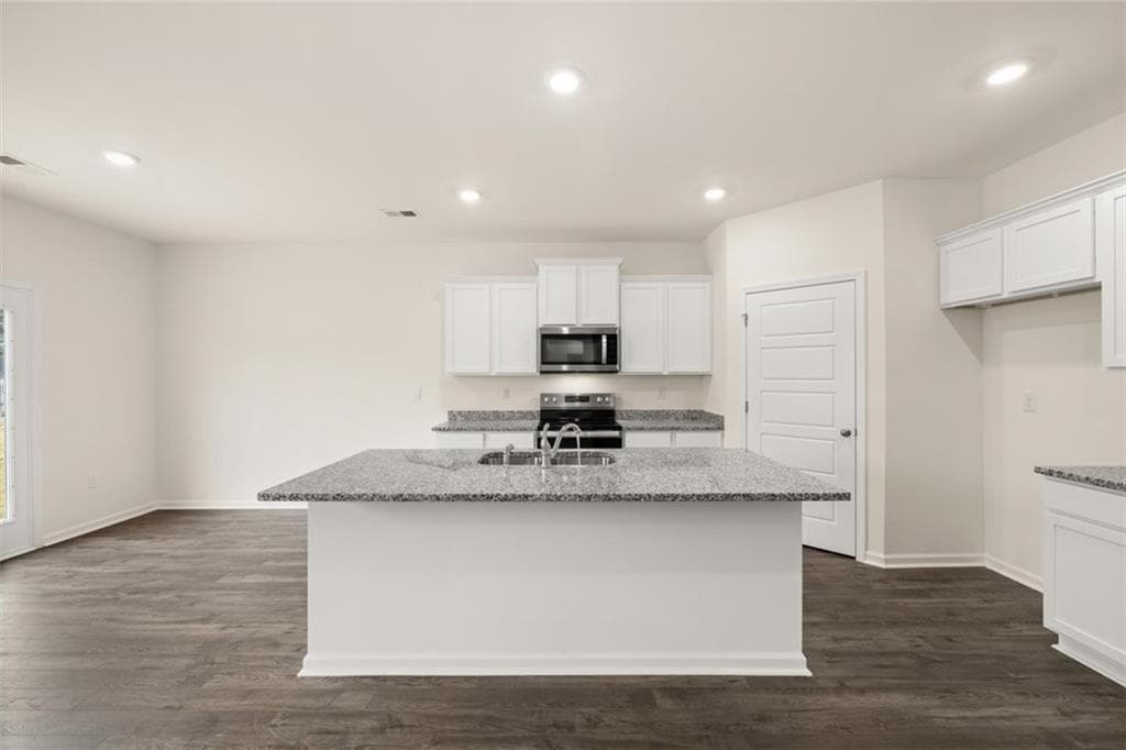 5 bedroom, 3 bathroom, 2,511 sq ft single family residence for sale at 8559 Secretariat Drive, Lithonia, GA 30058 — photo 6