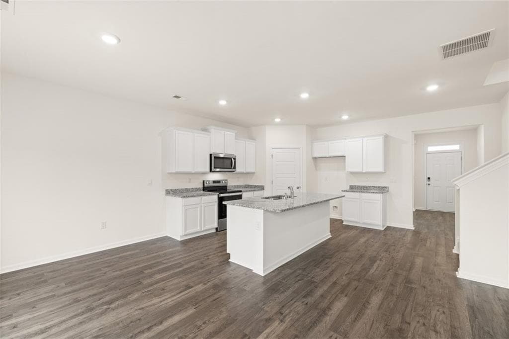 5 bedroom, 3 bathroom, 2,511 sq ft single family residence for sale at 8559 Secretariat Drive, Lithonia, GA 30058 — photo 7