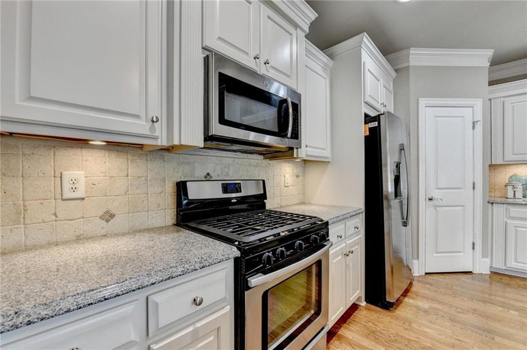 4 bedroom, 4 bathroom, 3,234 sq ft townhouse for sale at 5915 Vista Brook Drive, Suwanee, GA 30024 — photo 6