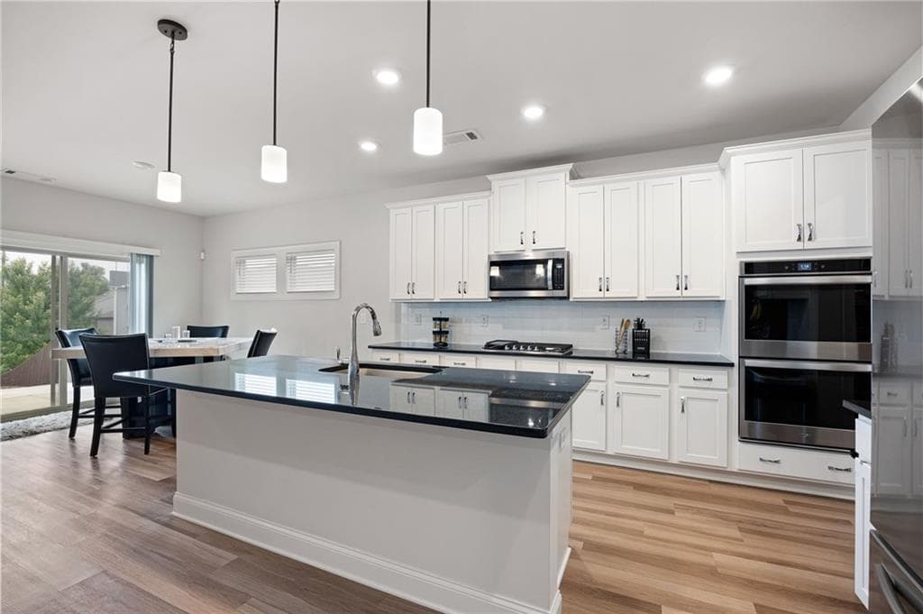 5 bedroom, 4 bathroom, 3,108 sq ft single family residence for sale at 103 Grove View Road, Woodstock, GA 30189 — photo 6