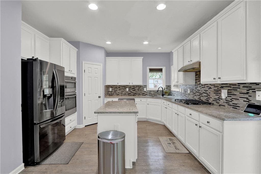 4 bedroom, 3 bathroom, 2,612 sq ft single family residence for sale at 2818 Stockbridge Way, Dacula, GA 30019 — photo 2