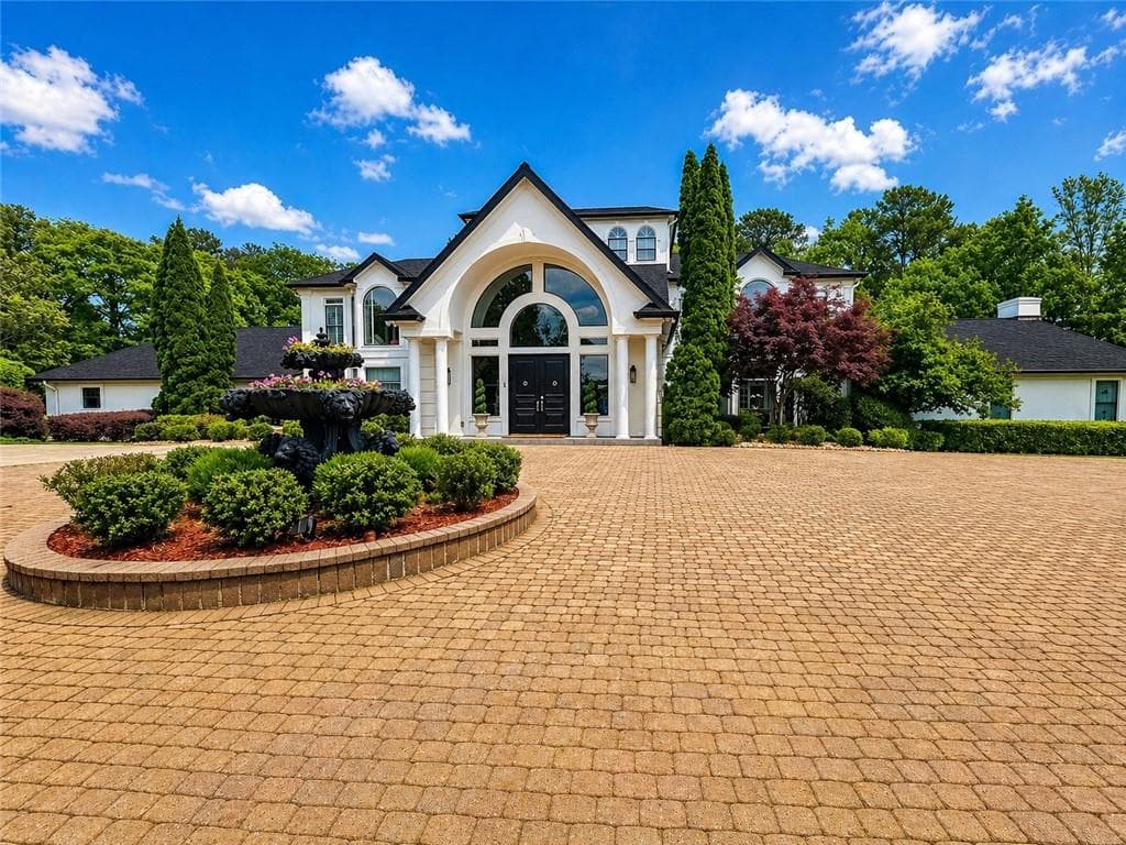 6 bedroom, 7 bathroom, 11,076 sq ft single family residence for sale at 4750 Ascot Drive, Cumming, GA 30028 — photo 1 of 42