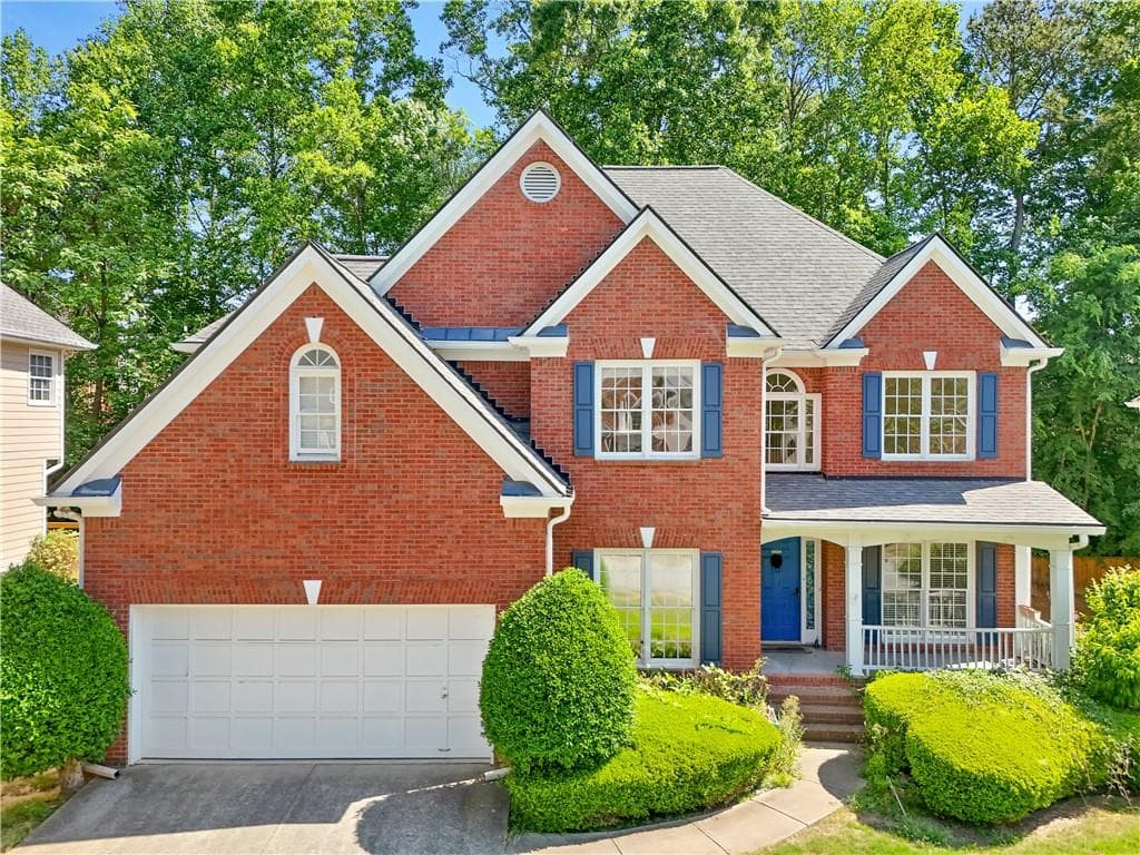 4 bedroom, 3 bathroom, 3,716 sq ft single family residence sold at 1494 Oglethorpe Drive, Suwanee, GA 30024