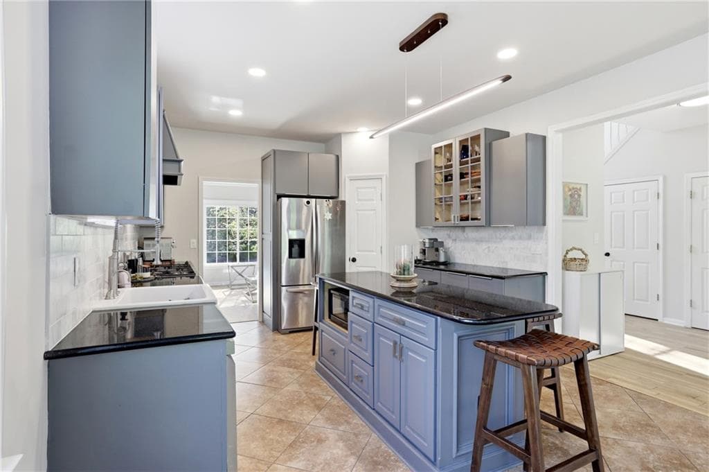 6 bedroom, 4 bathroom, 4,573 sq ft single family residence for sale at 1015 Windhaven Drive, Alpharetta, GA 30005 — photo 10