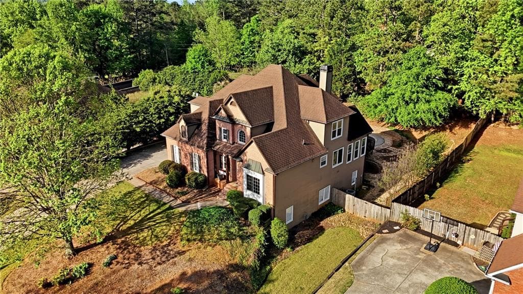 6 bedroom, 4 bathroom, 4,573 sq ft single family residence for sale at 1015 Windhaven Drive, Alpharetta, GA 30005