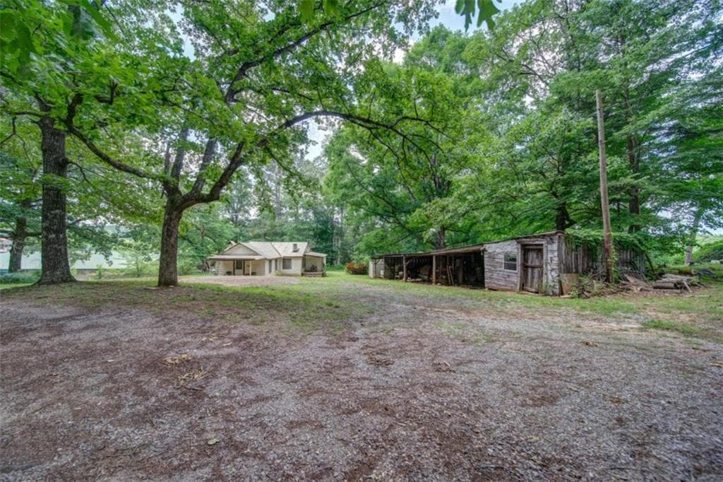 2 bedroom, 1 bathroom, 816 sq ft single family residence for sale at 261 Steve Tate Highway, Marble Hill, GA 30148