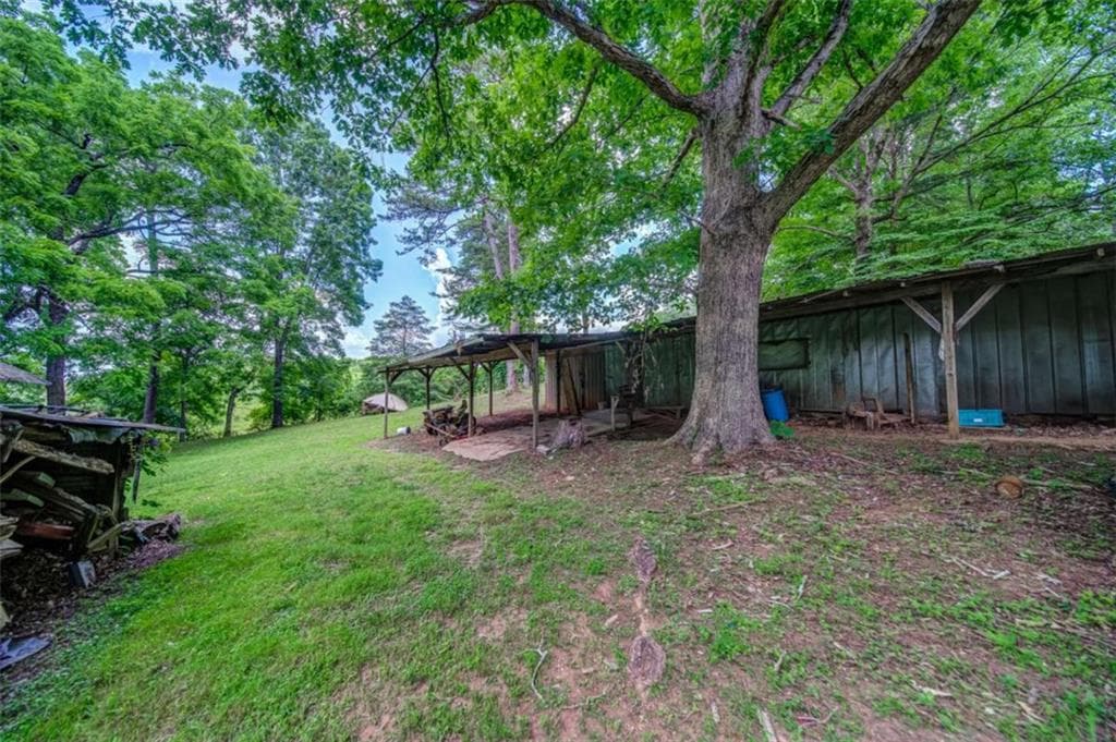 2 bedroom, 1 bathroom, 816 sq ft single family residence for sale at 261 Steve Tate Highway, Marble Hill, GA 30148 — photo 2