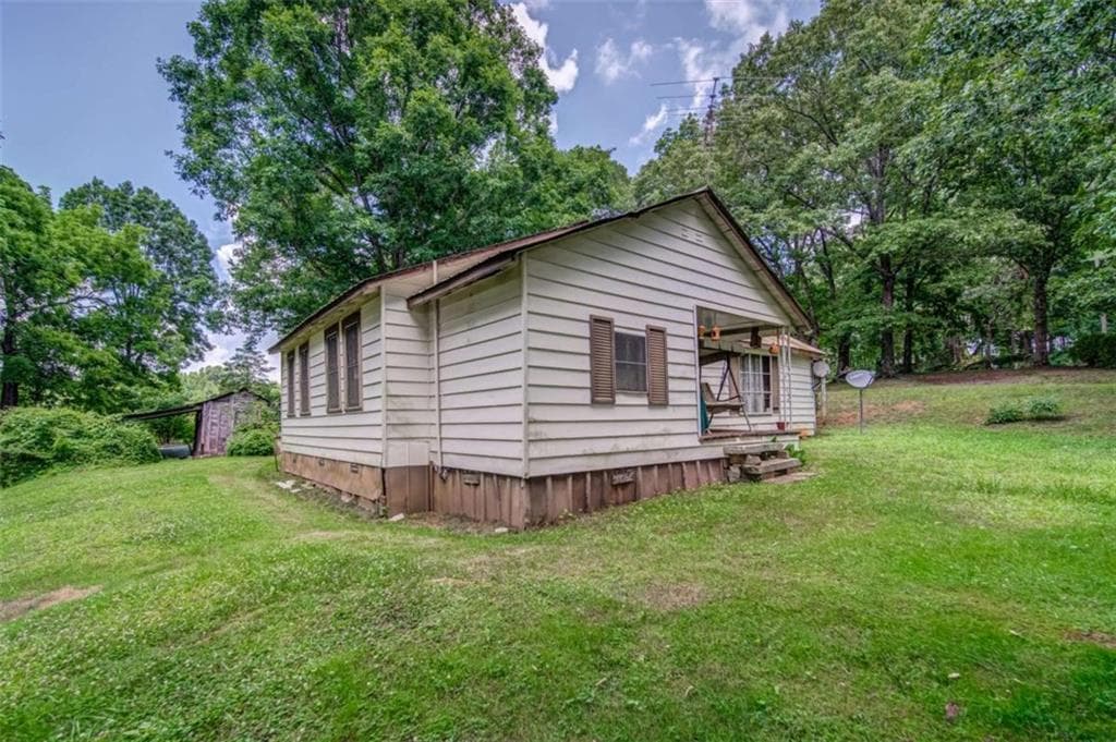 2 bedroom, 1 bathroom, 816 sq ft single family residence for sale at 261 Steve Tate Highway, Marble Hill, GA 30148 — photo 4