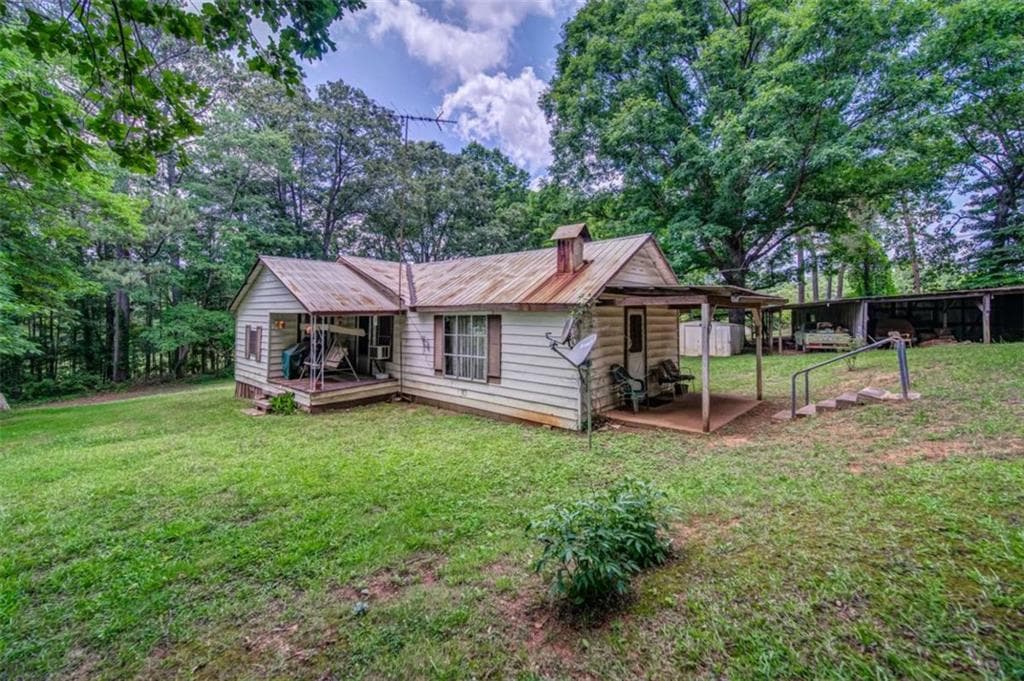 2 bedroom, 1 bathroom, 816 sq ft single family residence for sale at 261 Steve Tate Highway, Marble Hill, GA 30148 — photo 5