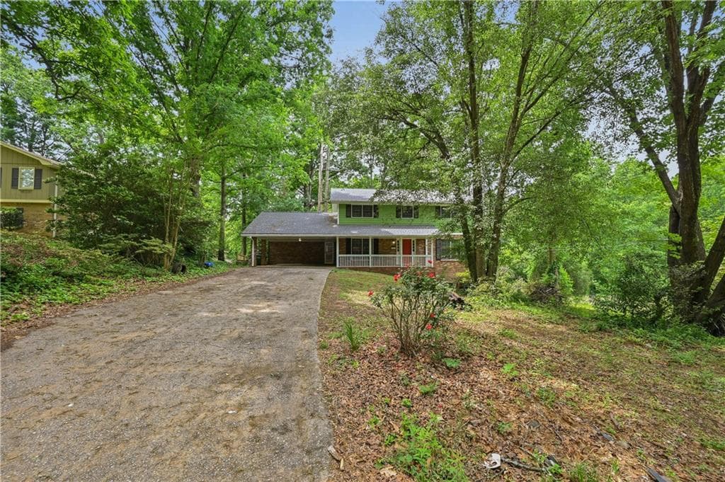 4 bedroom, 3 bathroom, 2,590 sq ft single family residence for sale at 1767 Grandeus Lane, Stone Mountain, GA 30087 — photo 2