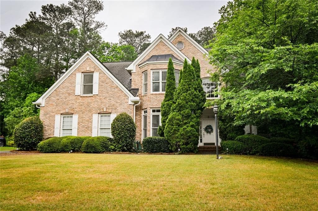 6 bedroom, 5 bathroom, 4,692 sq ft single family residence for sale at 2692 Dunmoore Drive, Snellville, GA 30078